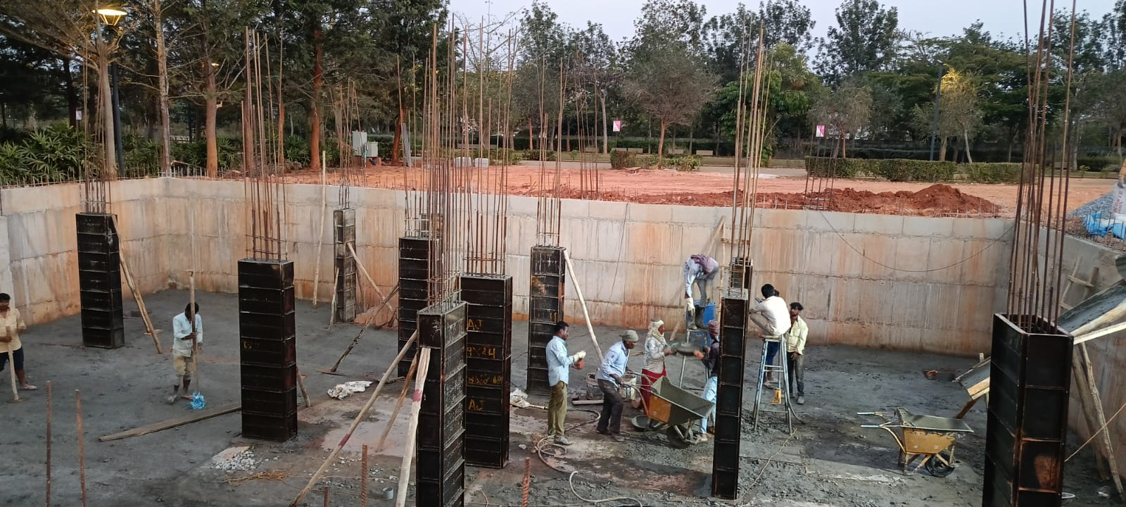 Steel column formwork and concreting works in progress